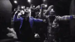 Man in blue jacket falls into crowd