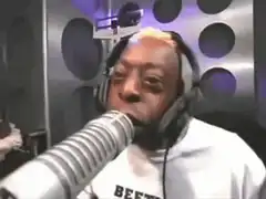 DJ Envy laughing in the studio