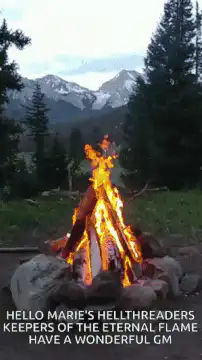 Campfire with mountains and text