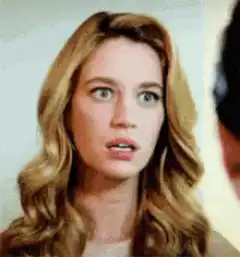 Woman's face scrunches up in disgust
