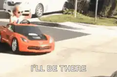 Toddler in toy car I'll be there