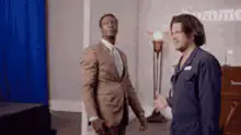 Derek and Charlie shake hands