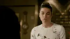 Woman sighs and rolls eyes