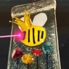 Bee with crown shooting laser