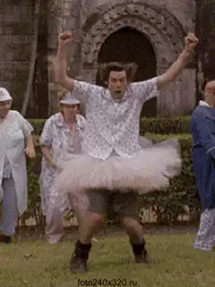 Man in tutu celebrating