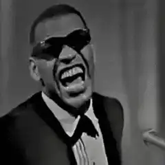 Jamie Foxx laughing in sunglasses