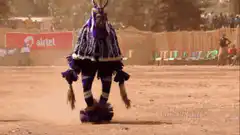 Dancer in purple costume spinning