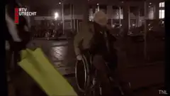 Man in wheelchair pushed over