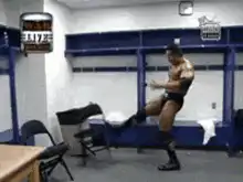 Wrestler kicks locker then table