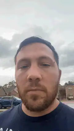 Man looking up at the sky