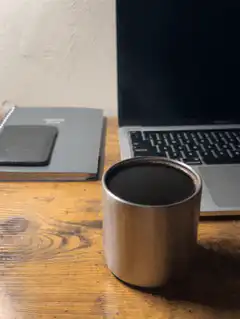 steam rising from hot coffee cup