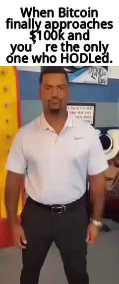 Man dancing when Bitcoin hits $100k