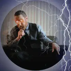 Man with glowing eyes and lightning