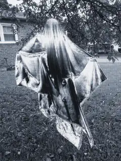 Ghost figure in a yard