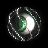 Green eye with orbiting beads