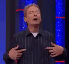 Bill Burr pointing at himself