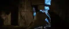 R2-D2 rolling under a door