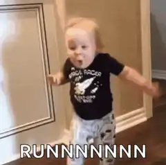 Toddler running with food on face