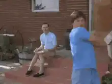 Two boys riding a bike