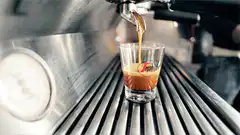 espresso pouring into glass