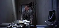 Man throws papers in frustration