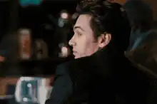 James Franco turns and smiles
