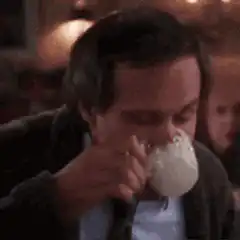 Man drinking from a mug