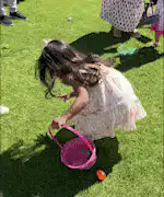 Little girl Easter egg hunt