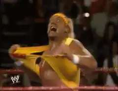 Hulk Hogan rips his shirt open