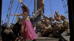 Belly dancer on pirate ship deck