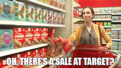 Woman excitedly grabs sale items at Target