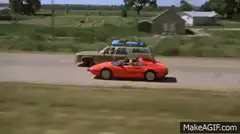 Daisy Duke and Duke driving cars