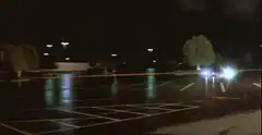 Car explosion in wet parking lot
