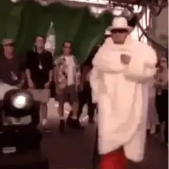 Snoop Dogg in white fur coat