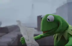 Kermit the Frog reading a map