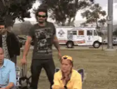 Him walking backwards to sit down