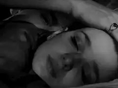 couple sleeping in bed