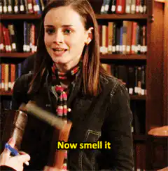 Clara Oswald tells the Doctor to smell the book