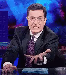 Stephen Colbert pointing at camera