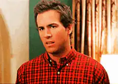 Ryan Reynolds looks up confused