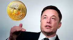 Elon Musk holding a Bitcoin