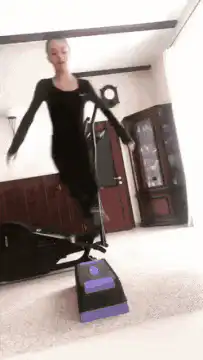 Woman on elliptical machine