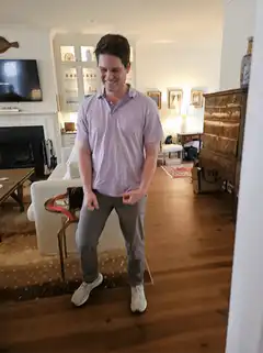 man dancing in living room