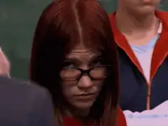 Girl with glasses side eye
