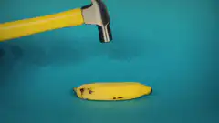 Hammer smashes banana into pieces