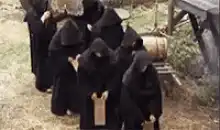 Monks bowing in a line