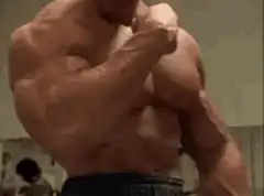 Muscular man flexing biceps