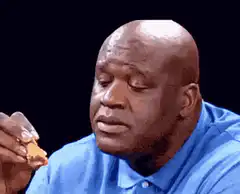 Shaquille O'Neal eating and reacting