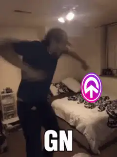 man jumping onto bed