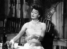 Woman pouring champagne into her dress